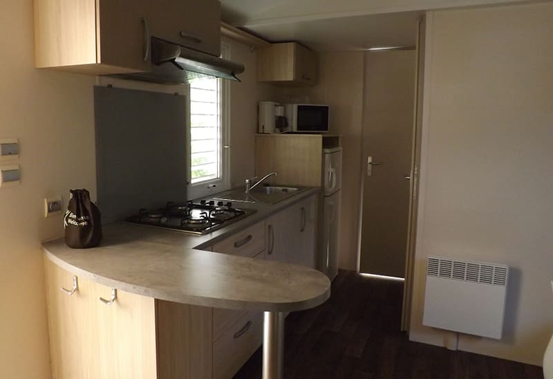 Kitchen: 2-bedroom 28-29m² mobilehome sleeping 4